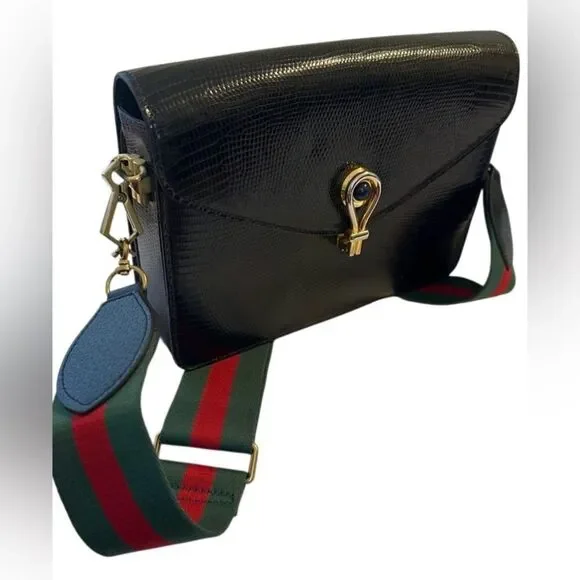 Gucci Black and Gold Leather Clutch